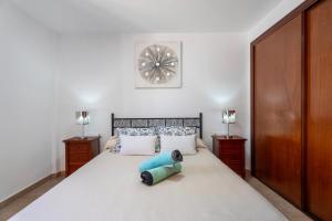 Ένα ή περισσότερα κρεβάτια σε δωμάτιο στο Apartamento Los Geranios +25 φωτογραφίες