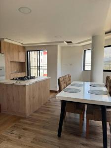 Kuchyň nebo kuchyňský kout v ubytování Apartamento en Sonsón