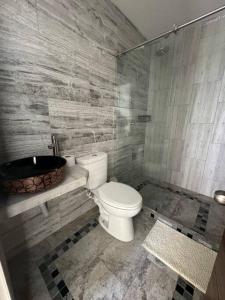 Koupelna v ubytování Apartamento en Sonsón