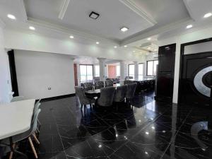a meeting room with chairs and a table in a building at Villa Monterrico in La Muerte +28 photos