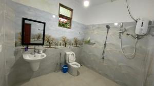 Ένα μπάνιο στο Elisha Place Hiriketiya