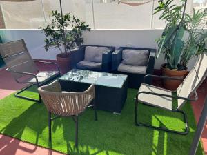 Posezení v ubytování Penthouse con terraza- 2D 2B- Triana