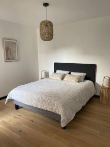 Katil atau katil-katil dalam bilik di Maison moderne à Belz
