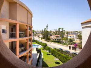 arial view of a building with a view of a courtyard at Beachfront Apartment Primera Línea 2-04 in Orihuela Costa