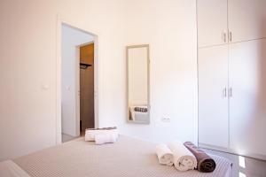 Ένα ή περισσότερα κρεβάτια σε δωμάτιο στο Kastro Shared Pool Suites