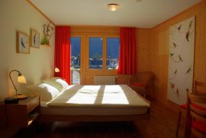 Letto o letti in una camera di Hotel Garni Hostatt