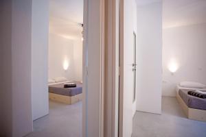 Ένα ή περισσότερα κρεβάτια σε δωμάτιο στο Kastro Shared Pool Suites