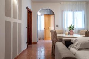 a living room with a table and a couch at Villa Flora in Perugia +82 photos