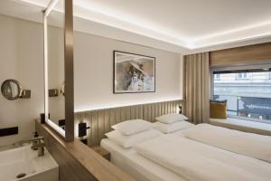 Postel nebo postele na pokoji v ubytování Hotel Schwarzer Bär