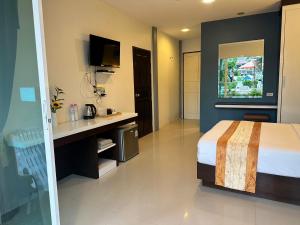 Voodi või voodid majutusasutuse Gypsy Sea View Resort- Phi Phi Island toas