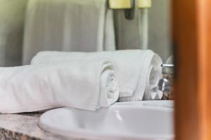 A bed or beds in a room at Hotel Amic Can Pastilla