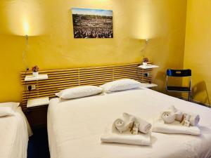 Smart Hotel Autodromo客房内的一张或多张床位
