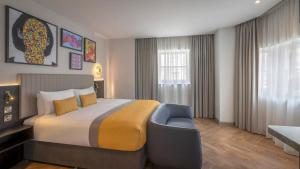 Maldron Hotel Brighton City Centre客房内的一张或多张床位