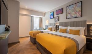 Maldron Hotel Brighton City Centre客房内的一张或多张床位