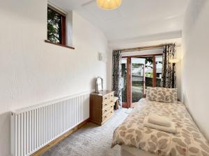 Voodi või voodid majutusasutuse Linhay, Nr Barnstaple with outdoor pool, free wifi and parking toas +14 fotot