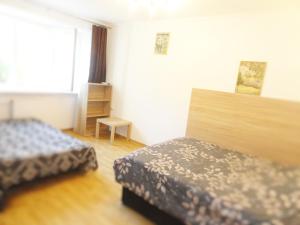 Postel nebo postele na pokoji v ubytování Quiet Center Apartment Arena Riga FREE PARKING