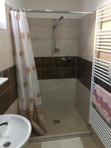 Koupelna v ubytování SUNNY Apartman