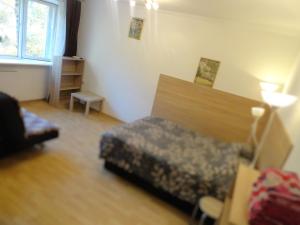 Postel nebo postele na pokoji v ubytování Quiet Center Apartment Arena Riga FREE PARKING + 7 fotografií