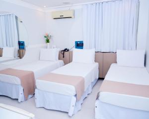 Postel nebo postele na pokoji v ubytování Hotel Sempre Bahia + 37 fotografií