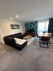 Posezení v ubytování Ferienwohnung Tarushi