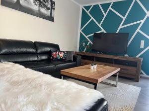 Posezení v ubytování Ferienwohnung Tarushi
