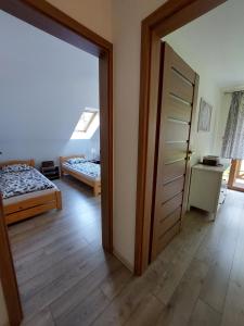 Letto o letti in una camera di Domek na Leśnej Wisła