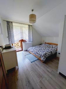 Letto o letti in una camera di Domek na Leśnej Wisła