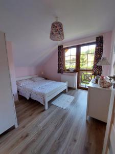 Letto o letti in una camera di Domek na Leśnej Wisła