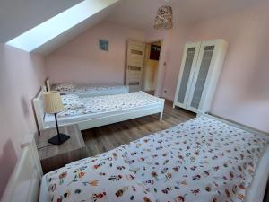 Letto o letti in una camera di Domek na Leśnej Wisła