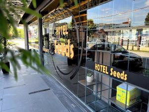 a store front window at Seeds Hotel Klang Bayu Perdana in Klang +13 photos