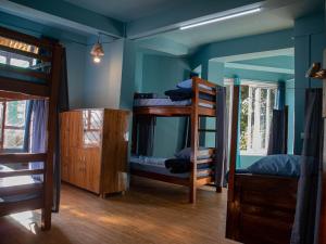 Voodi või voodid majutusasutuse Hills Tale Backpackers Hostel toas