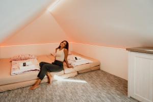 Posteľ alebo postele v izbe v ubytovaní Apartmány Habánská, celý dům
