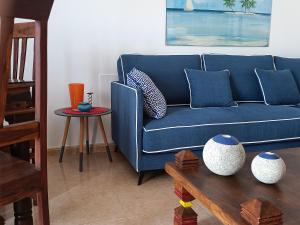Posedenie v ubytovaní Casa Vacanza in Oasis Tamarindo