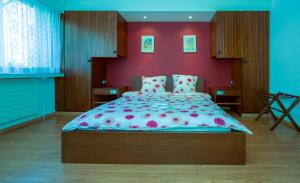 Tempat tidur dalam kamar di Metropol