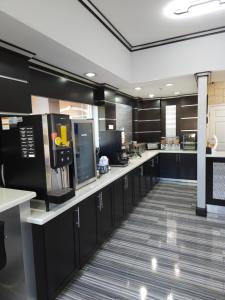 Kuchyň nebo kuchyňský kout v ubytování Executive Inn and Suites Tyler