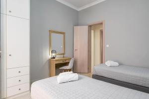 A bed or beds in a room at Casa Centrale ad Argostoli!
