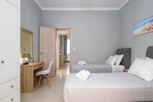 A bed or beds in a room at Casa Centrale ad Argostoli!