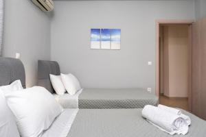 A bed or beds in a room at Casa Centrale ad Argostoli!
