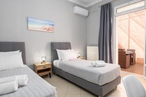 A bed or beds in a room at Casa Centrale ad Argostoli!