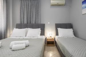 A bed or beds in a room at Casa Centrale ad Argostoli!