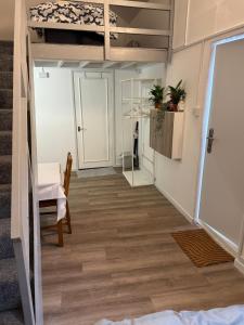 Ένα ή περισσότερα κρεβάτια σε δωμάτιο στο Studio with 3 beds- 20 min from London Bridge and Gatwick Airport +7 φωτογραφίες