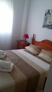 Ein Bett oder Betten in einem Zimmer der Unterkunft Valparaiso
