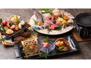 a table with three plates of food on it at Tokigasane - Vacation STAY 21018v in Kaga