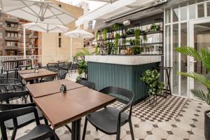 Um restaurante ou outro lugar para comer em TARATA BOUTIQUE HOTEL