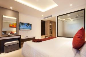 TV a/nebo společenská místnost v ubytování Paripas Patong Resort