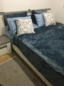 Letto o letti in una camera di Résidence les deux palmiers Temara Rabat
