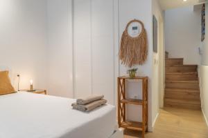 Postel nebo postele na pokoji v ubytování Urban Chic Loft Malaga City Center