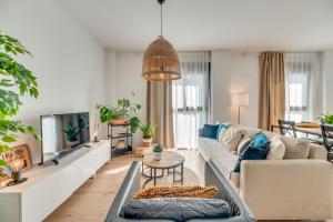 TV a/nebo společenská místnost v ubytování Urban Chic Loft Malaga City Center