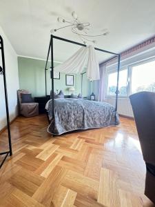 Postel nebo postele na pokoji v ubytování Pension FAULPELZ - Apartment mit Küche, Badewanne
