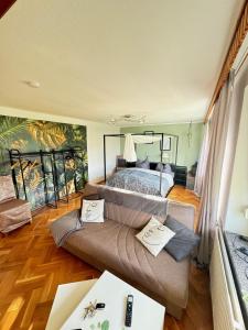 Posezení v ubytování Pension FAULPELZ - Apartment mit Küche, Badewanne